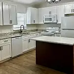 Woodex: White Shaker Cabinets with Forevermark: Petit Brown Island