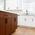 Woodex: White Shaker Cabinets with Forevermark: Petit Brown Island